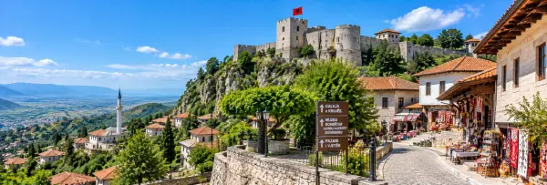 Krujë, Albania, with its historic castle, Old Bazaar, stone houses, and mountain landscape