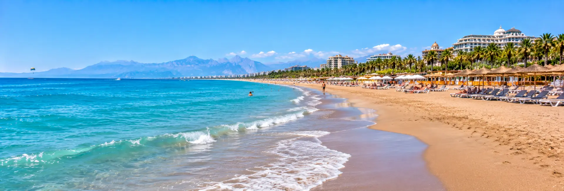 Lara Beach in Antalya, Türkiye, with turquoise Mediterranean waters and luxury resorts