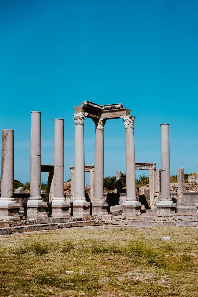 Roman columns and ornate gateway ruins at Perge Archaeological Site