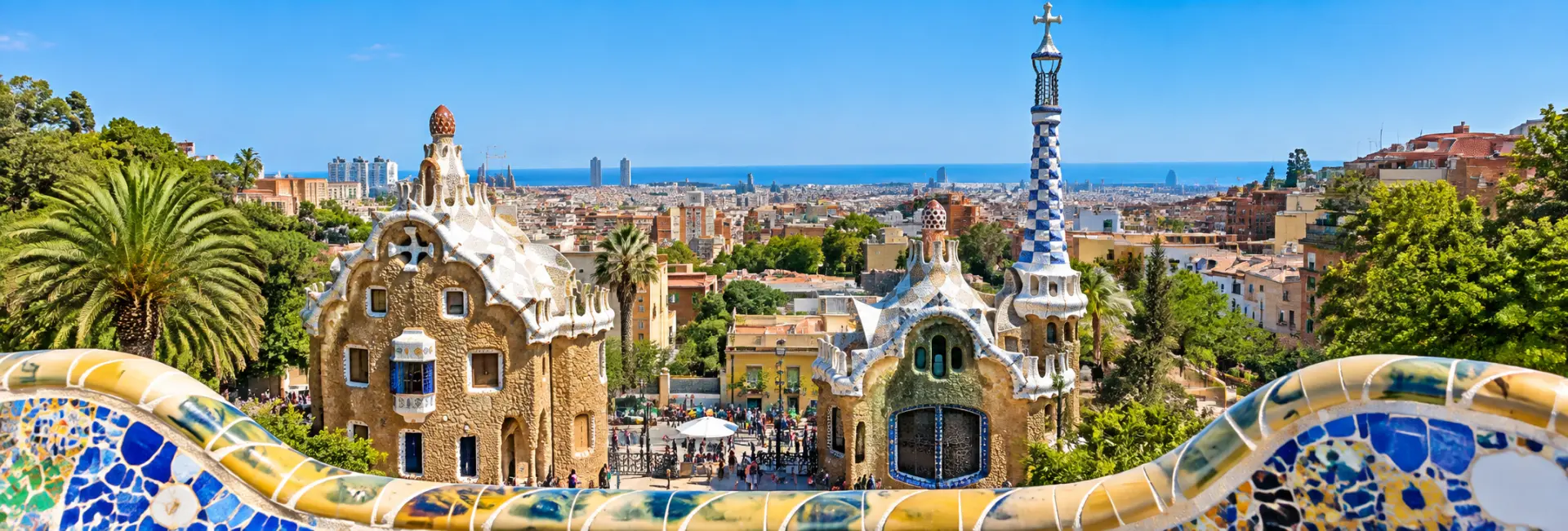 Park Güell in Barcelona, Spain, featuring Gaudí’s colorful mosaic architecture and city views