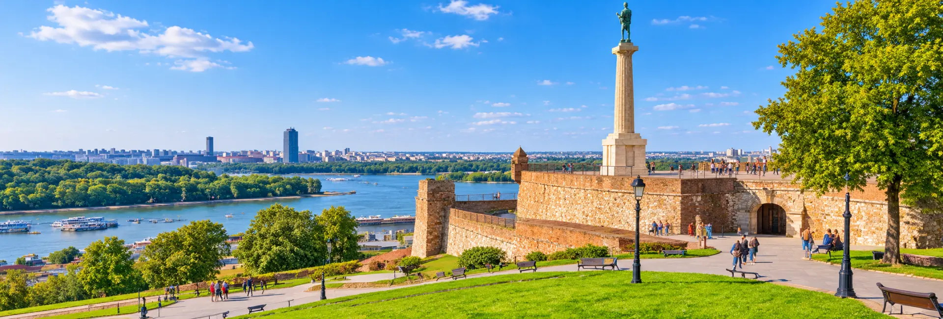 Kalemegdan Park in Belgrade, Serbia, featuring historic fortress walls, green gardens, and river views.