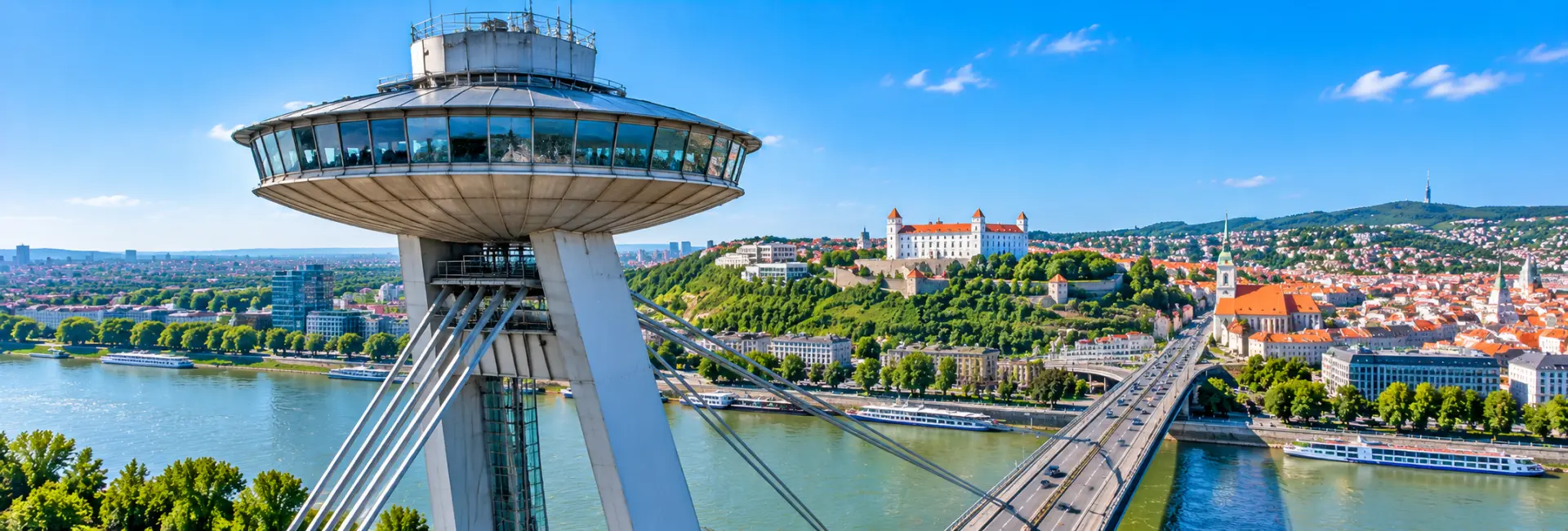 UFO Observation Deck atop the SNP Bridge overlooking the Danube River and Bratislava Castle in Slovakia.