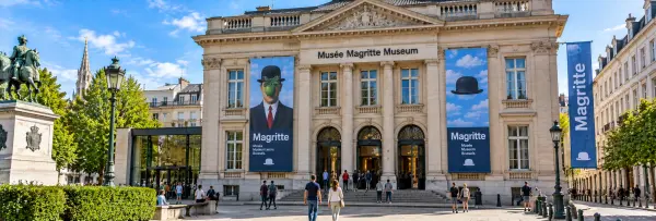 Magritte Museum in Brussels, Belgium, with its neoclassical façade and distinctive Magritte banners