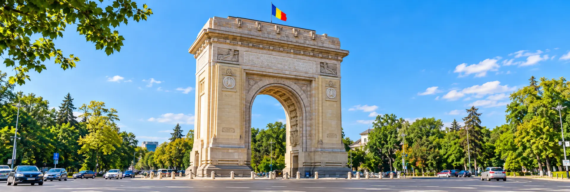 Arcul de Triumf (Triumph Arch) in Bucharest, Romania, featuring its grand stone arch and intricate carvings.