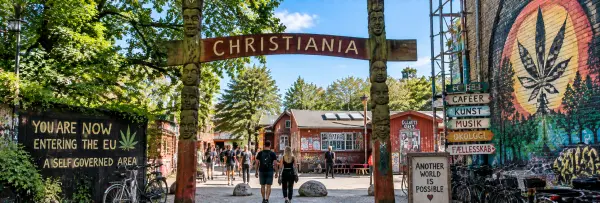 Freetown Christiania in Copenhagen, Denmark, with colorful street art and bohemian buildings