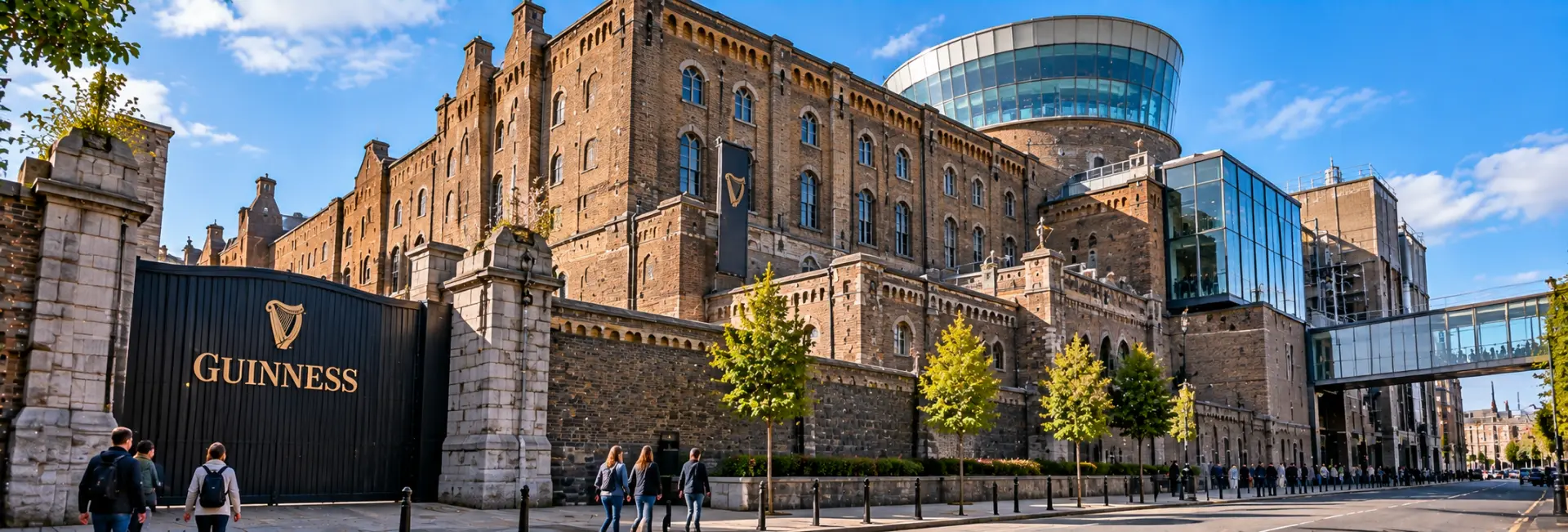 Guinness Storehouse in Dublin with its historic brick brewery and glass structure