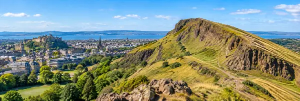 Arthur’s Seat overlooking Edinburgh, Scotland, with rugged hills, walking trails and the city skyline