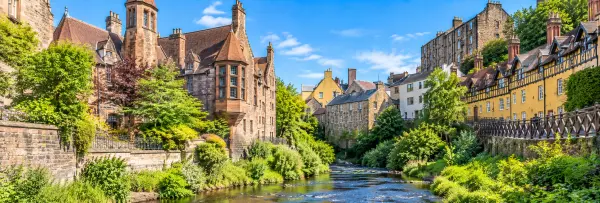 Dean Village in Edinburgh with historic stone buildings along the Water of Leith
