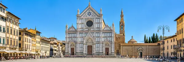 Basilica of Santa Croce in Florence, Italy, with its ornate marble façade and historic Piazza Santa Croce