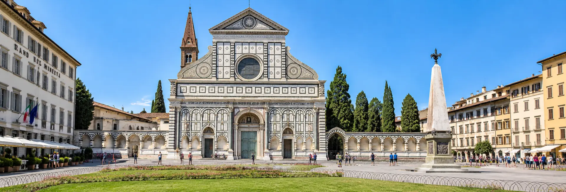 Basilica of Santa Maria Novella in Florence, Italy, with its ornate marble façade and Piazza Santa Maria Novella