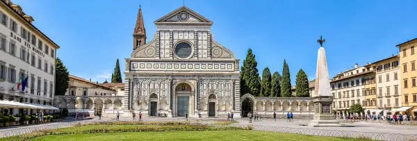 Basilica of Santa Maria Novella in Florence, Italy, with its ornate marble façade and Piazza Santa Maria Novella