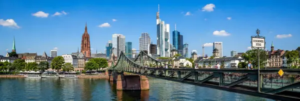 Eiserner Steg footbridge over the Main River with Frankfurt skyline