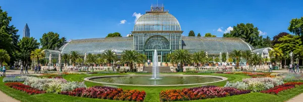 Palmengarten Frankfurt with historic Palm House, fountain and colorful botanical gardens
