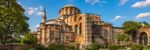 Chora Church (Kariye Mosque) in Istanbul with its historic brick walls, domes, and minaret.