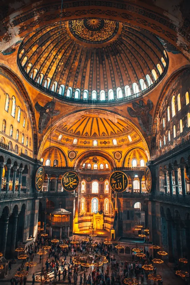 Hagia Sophia interior with its grand dome, Byzantine details, and Islamic calligraphy.