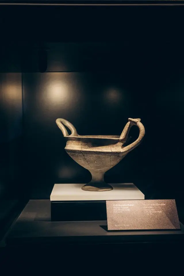 Ancient two-handled ceramic vessel displayed at Istanbul Archaeological Museums.