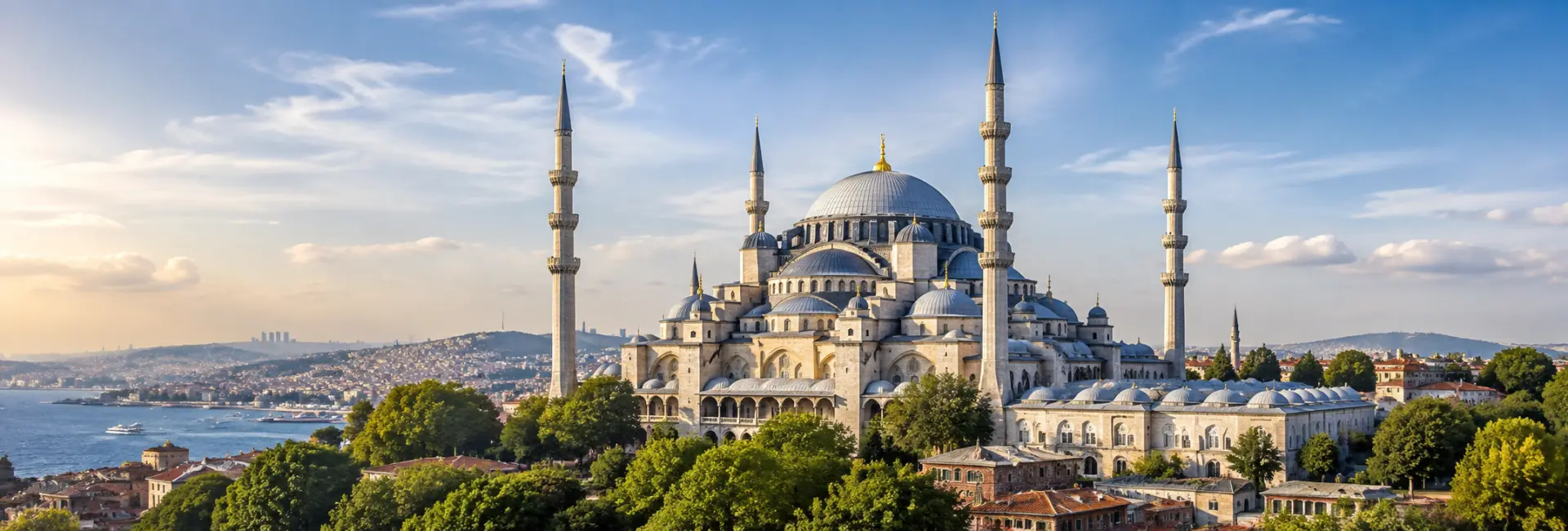Süleymaniye Mosque in Istanbul with its grand dome, four minarets, and the Bosphorus in the background.