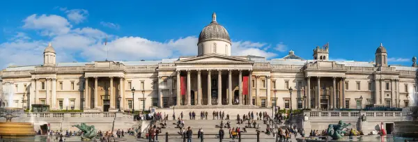 The National Gallery overlooking Trafalgar Square in London on a bright sunny day