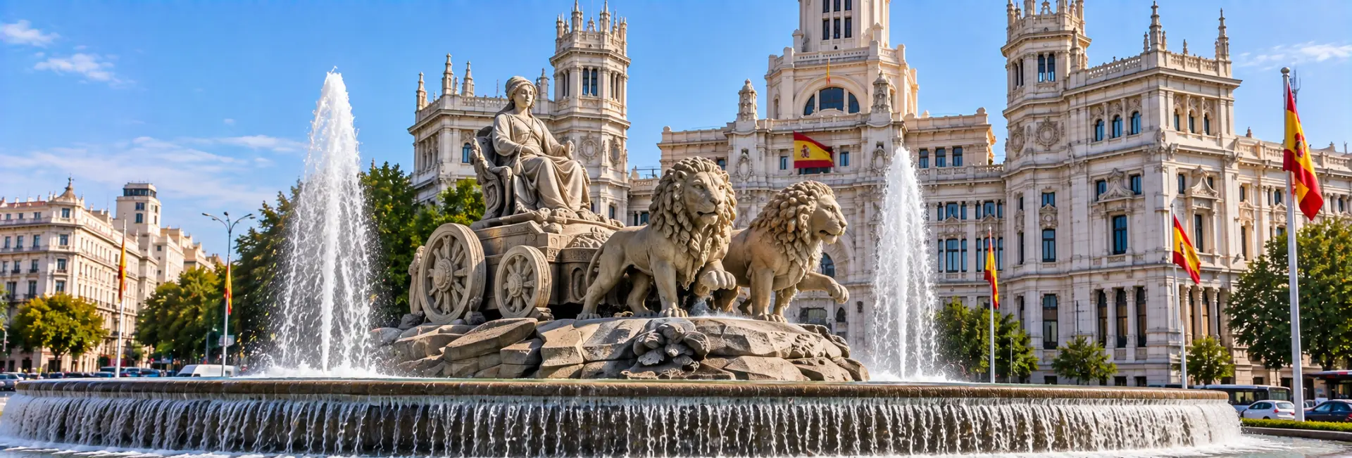 Cibeles Fountain in Madrid with its chariot, stone lions, and Palacio de Cibeles