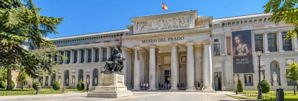 Prado Museum in Madrid with its grand neoclassical façade and Velázquez statue