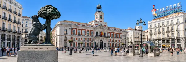 Puerta del Sol in Madrid with the Bear and Strawberry Tree statue and historic buildings