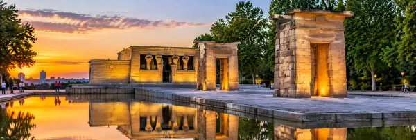 Temple of Debod in Madrid at sunset with its ancient Egyptian architecture and reflecting pool