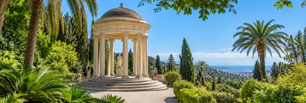 Jardín Botánico-Histórico La Concepción in Málaga with a domed pavilion and lush palms.