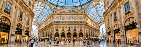 Galleria Vittorio Emanuele II with its glass dome, ornate architecture and luxury shops in Milan