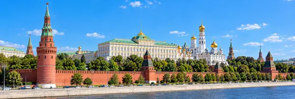 Moscow Kremlin with red-brick walls, towers, palaces and golden-domed cathedrals