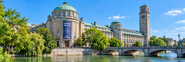 Deutsches Museum in Munich, Germany, beside the Isar River and historic bridge