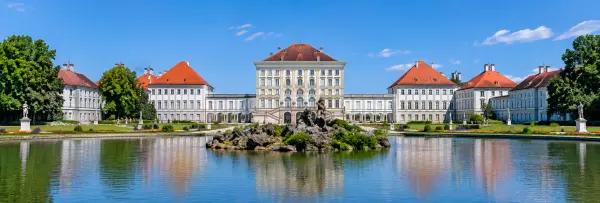 Nymphenburg Palace in Munich, Germany, viewed across its reflective palace pond