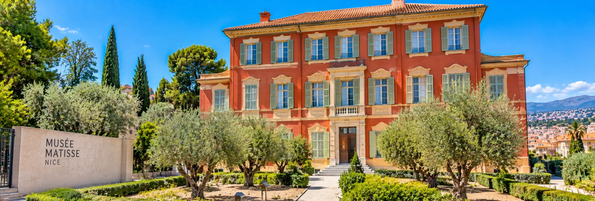 Musée Matisse in Nice, France, set in a historic red villa surrounded by Mediterranean gardens