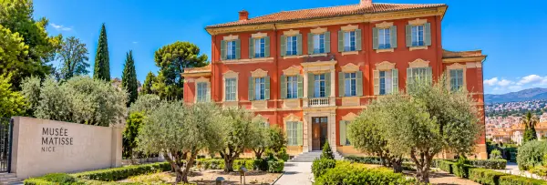Musée Matisse in Nice, France, set in a historic red villa surrounded by Mediterranean gardens