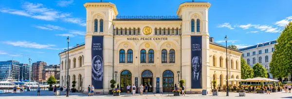 Nobel Peace Center in Oslo, Norway, showcasing its historic architecture beside the waterfront.