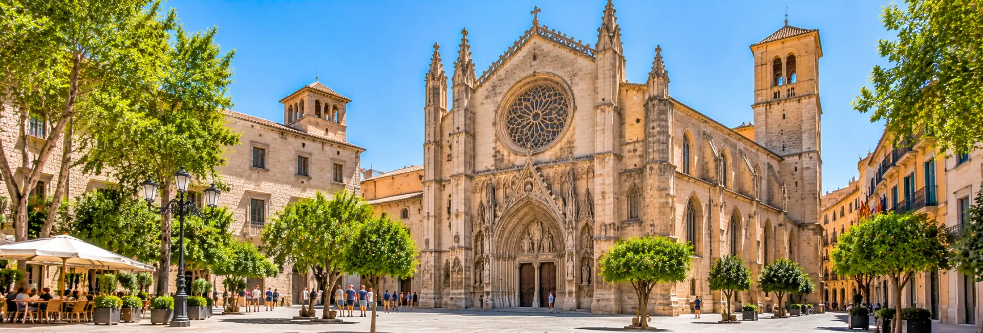 Basilica of Sant Francesc in Palma de Mallorca, featuring Gothic architecture and a historic stone façade.