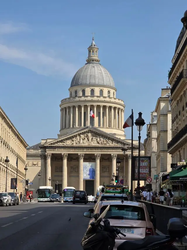 Exterior view of the Panthéon in Paris with its grand dome and neoclassical columns