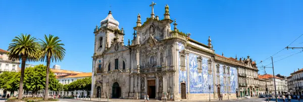 Carmo Church in Porto, Portugal, featuring its ornate Baroque façade and blue-and-white azulejo tiles.