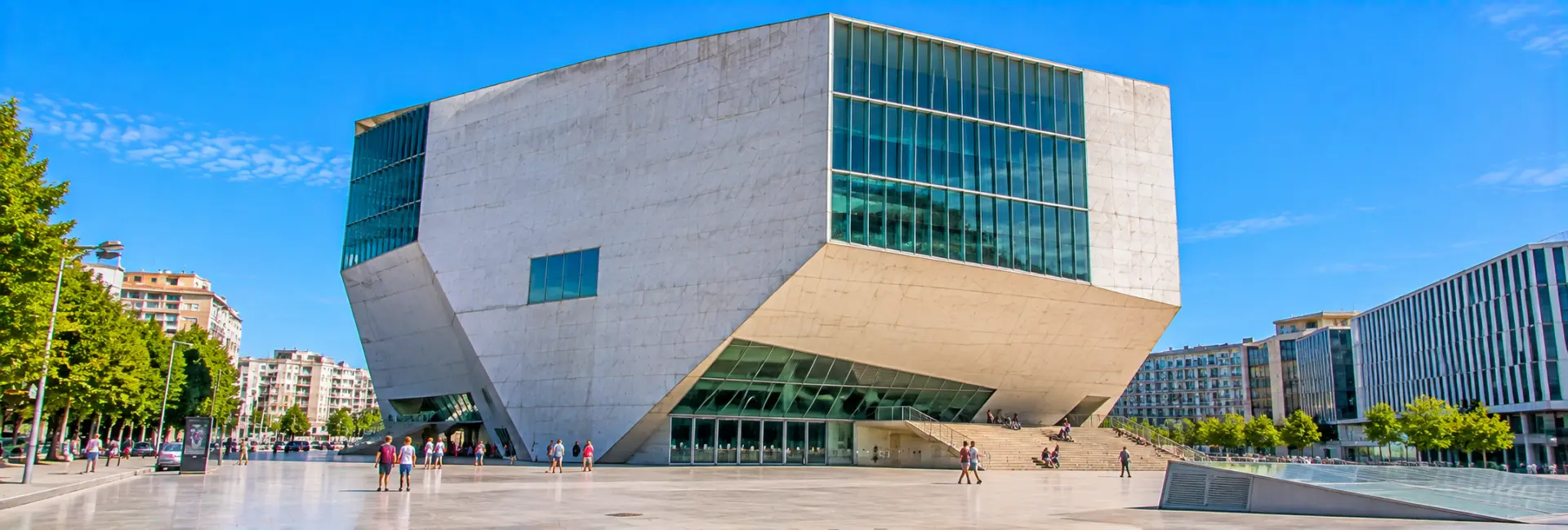 Casa da Música in Porto, Portugal, featuring modern geometric architecture and a spacious plaza.