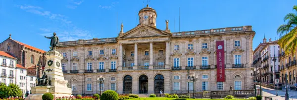 Palácio da Bolsa in Porto, Portugal, featuring its grand neoclassical façade, clock tower, and columned entrance.