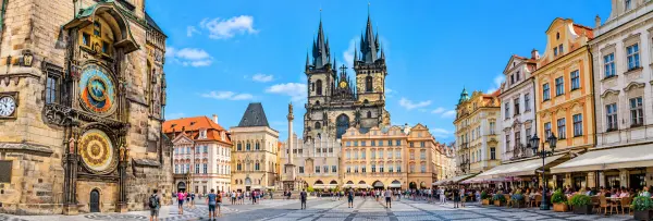 Old Town Square in Prague with the Astronomical Clock, Týn Church, and colorful historic buildings