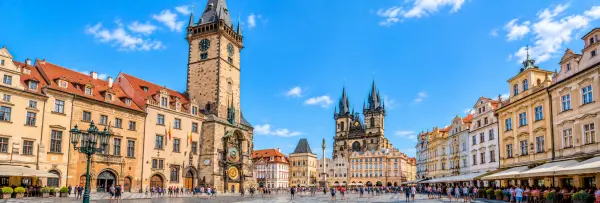 Full Prague Astronomical Clock tower overlooking the historic Old Town Square