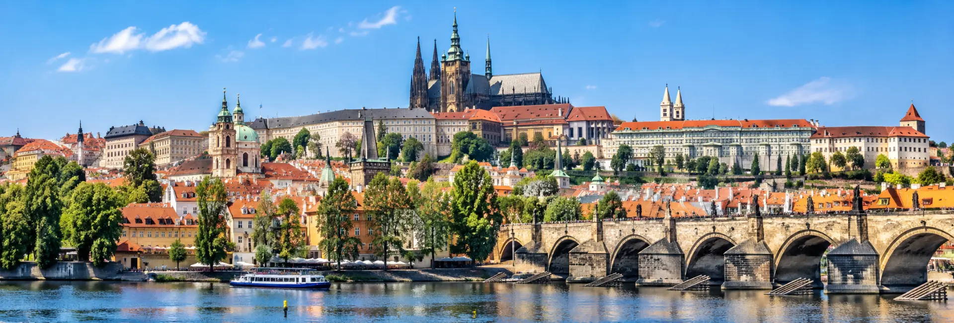 Prague Castle overlooking Prague’s historic rooftops and Charles Bridge