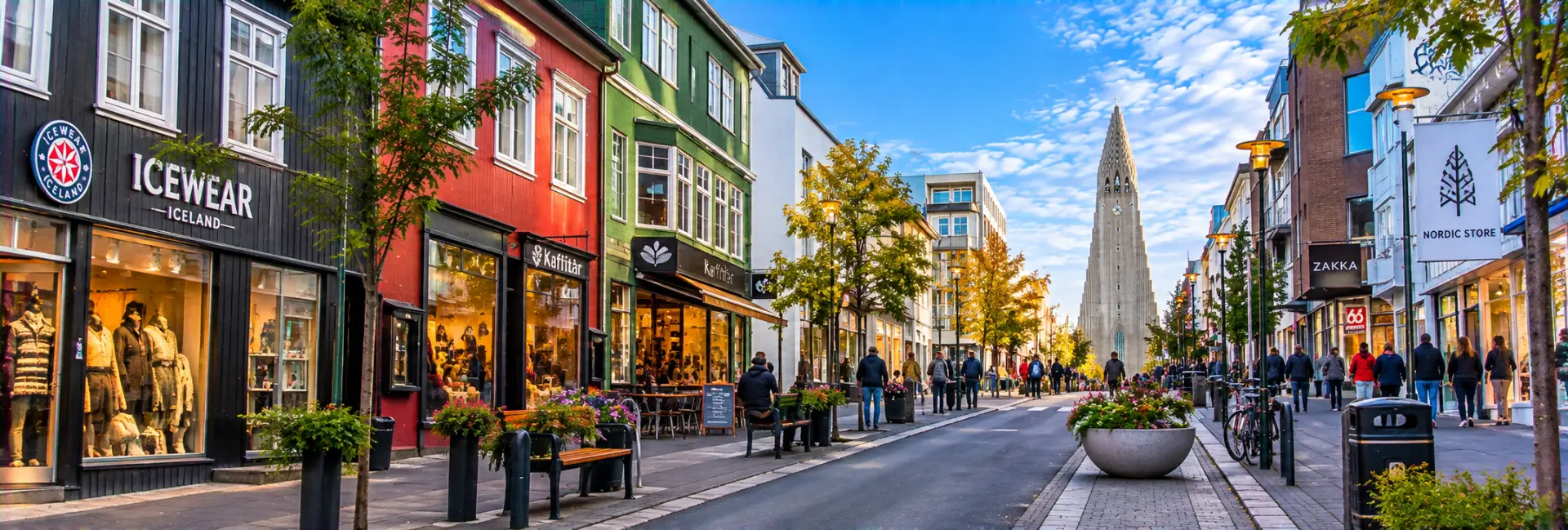Laugavegur Street in Reykjavík lined with colorful shops, cafés and Hallgrímskirkja