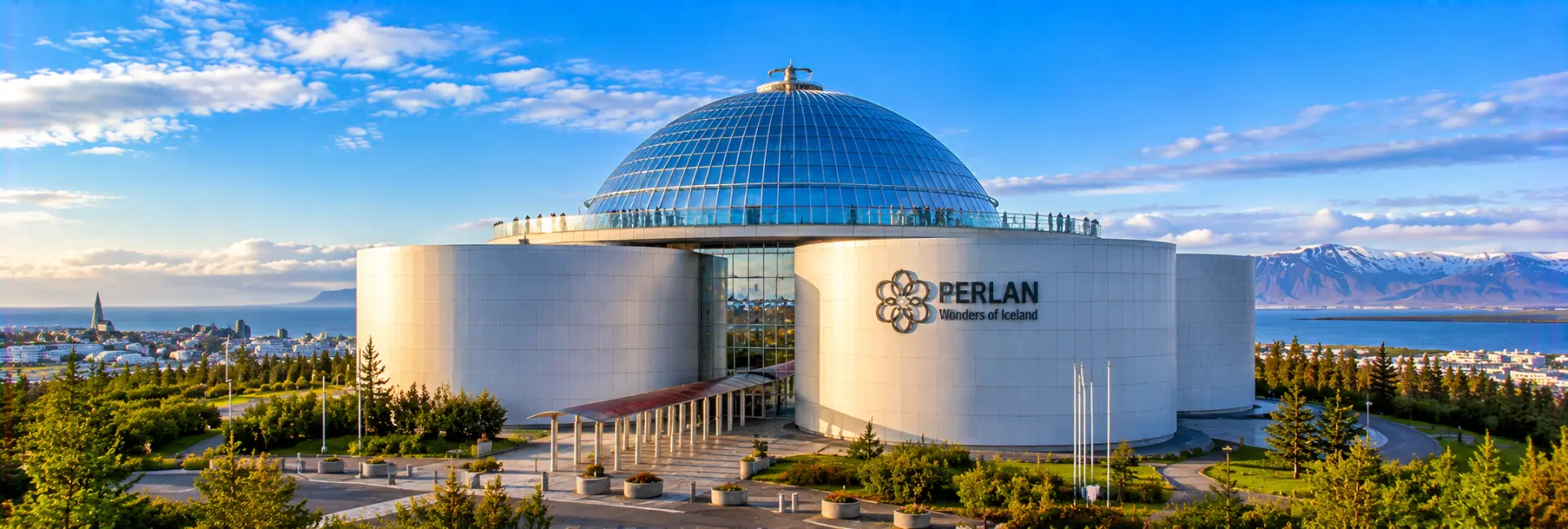 Perlan in Reykjavík with its glass dome overlooking the city and snowy mountains