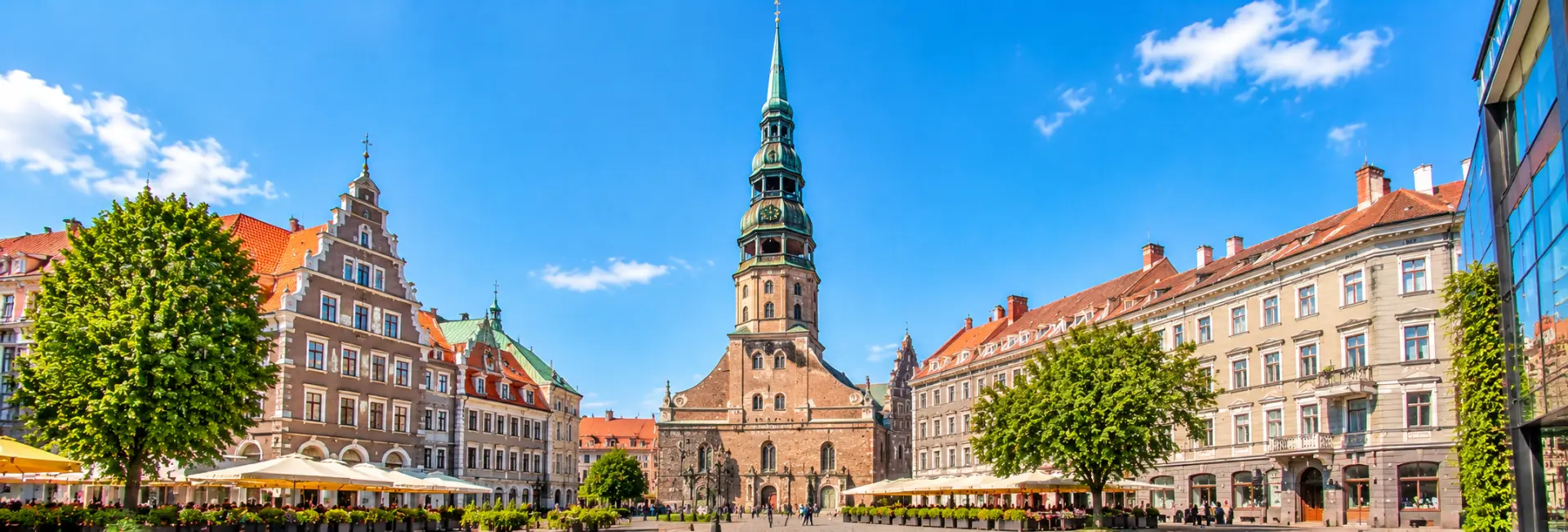 St. Peter’s Church in Riga, Latvia, featuring its towering Gothic spire, historic brick architecture and Old Town square