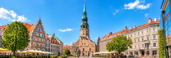 St. Peter’s Church in Riga, Latvia, featuring its towering Gothic spire, historic brick architecture and Old Town square