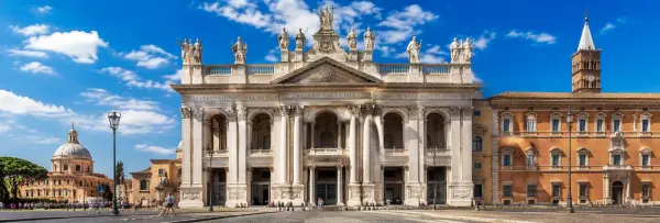 Archbasilica of Saint John Lateran in Rome with its grand Baroque façade under a blue sky