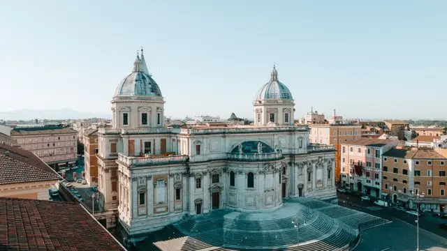 Exterior view of Basilica di Santa Maria Maggiore with twin domed towers