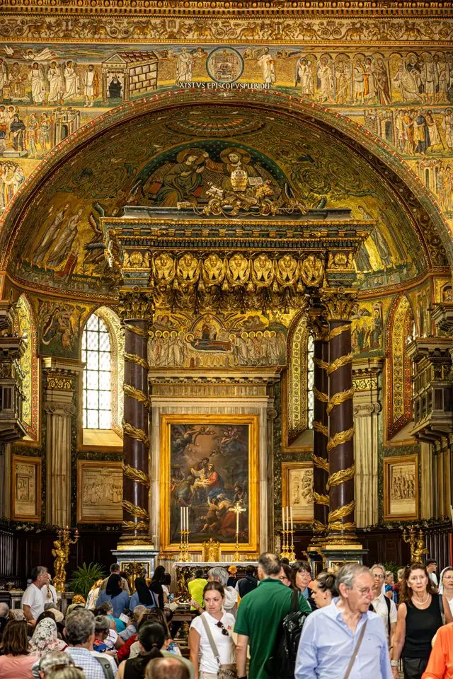 Golden mosaic and ornate altar inside Basilica di Santa Maria Maggiore