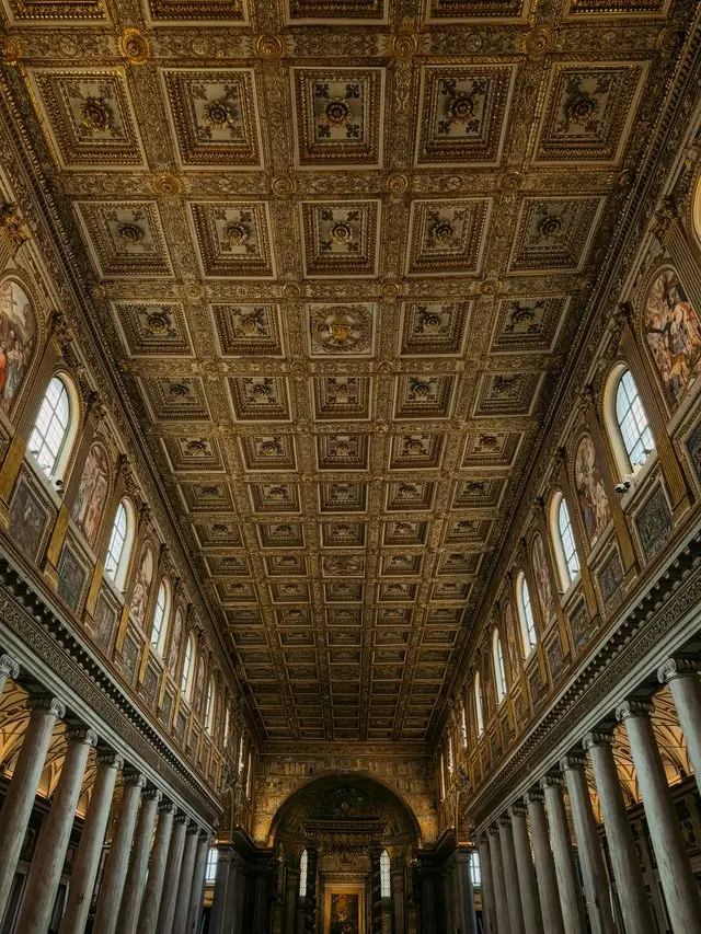Ornate coffered ceiling and columns inside Basilica di Santa Maria Maggiore